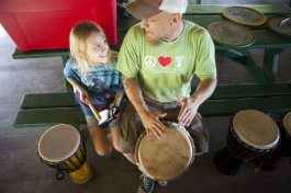 Steve Turner and his daughter Sequoia play a drum circle. 
