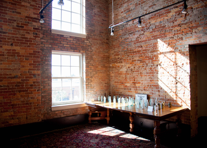 Antique bottles sit inside the historical Florida Brewery that is now used as space for lawyers who honor the building's history.