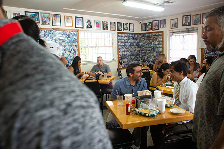 Elvin Martinez, left, and Jacob Kallupura have breakfast at the West Tampa Sandwich Shop.