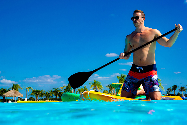 A model demonstrates what it could be like to paddleboard at Crystal Lagoon.