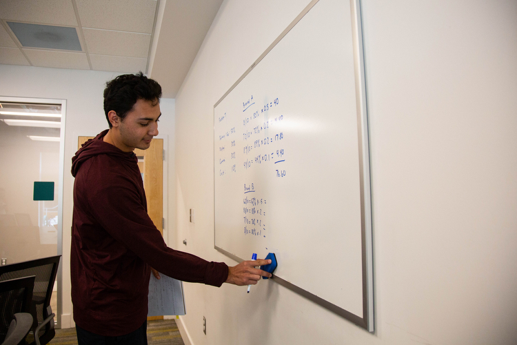 Isaac Mendez studies for a statistics class inside Beacon Hall.