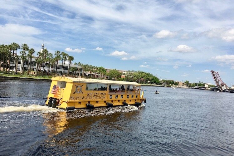 Water taxi delivers passengers up and down the Hillsborough River in downtown Tampa.