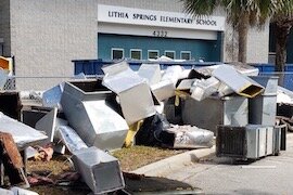 Construction waste piles up outside Lithia Springs Elementary in East Hillsborough County.