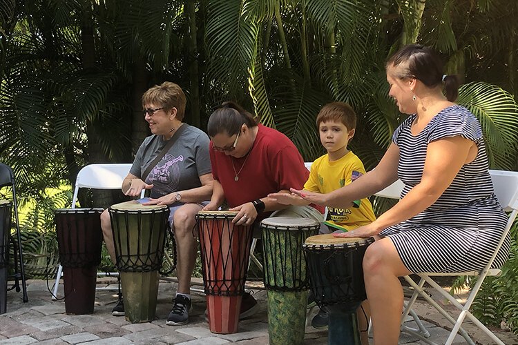 Guests participate in music performance at the Woodson Museum in St. Pete.