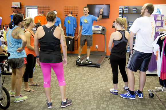 Cody Angell, owner of St Pete Running Company, chats with the Thursday run club. 