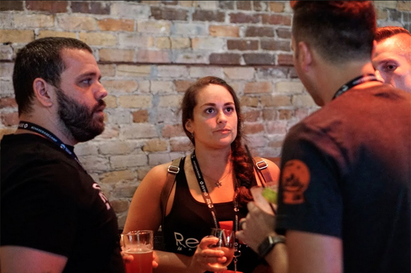 Local entrepreneurs chat with one another over drinks during the Tampa Bay Startup Week happy hour party at Franklin Manor.