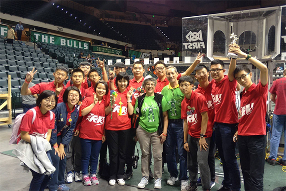 Steve and Terri Willingham with the Red Hurricanes FIRST Robotics Competition team from China.