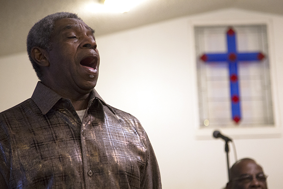 Deacon Robert Berrien sings during service at First Prospect Baptist Church in Wimauma. 
