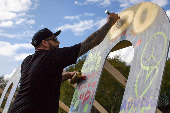 Salvatore Nastasia a graffiti artist from Fort Pierce adds to the Color St. Pete art installation.