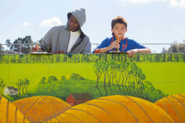 Students learn about agriculture via large scale art at Greco Middle School.