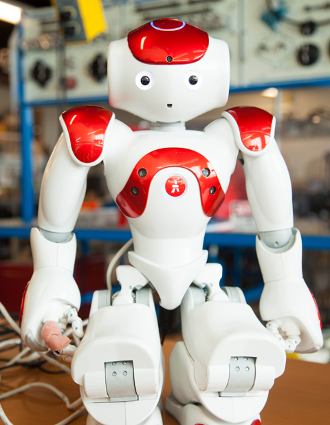 A humanoid is used to teach ways robots can help humans in daily life at HCC.