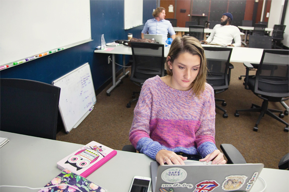 Emma Wolgast, a social media intern at Tampa Bay Wave, in the company's co-working space.