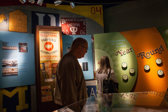 Zach Estrin of Venice, Fla., passes through an exhibit at the Tampa Bay History Center. 
