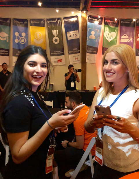 Alessa Solien (left) and panelist Stefanie Jewett exchange Instagram handles at the TBSW18 kickoff party.