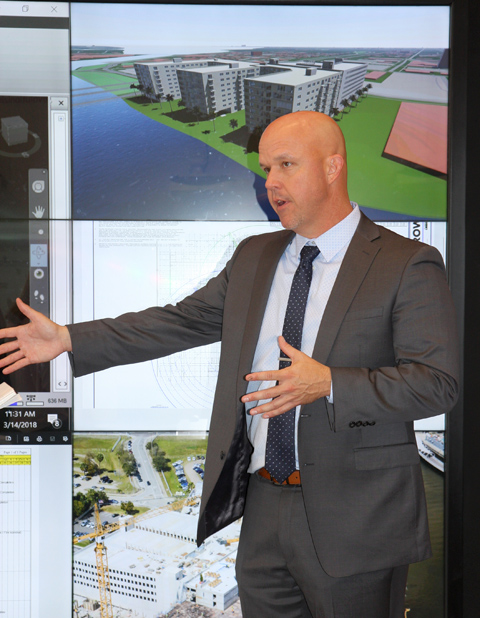 Josh Christensen converses in the new Tampa Smart Lab.