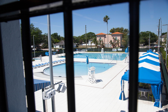 Original windows from 1941 look out over the pool at the JCC in West Tampa.