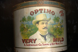 Santaella cigar tin - Optimo brand - featuring an image of Antonio Santaella.