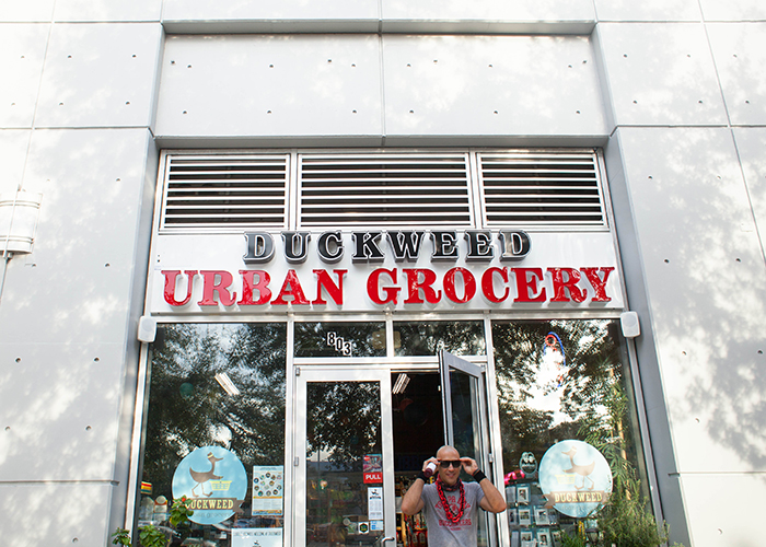 Brian Edwards of downtown Tampa exits Duckweed Urban Grocery, winner of the 2018 Marketplace Award.
