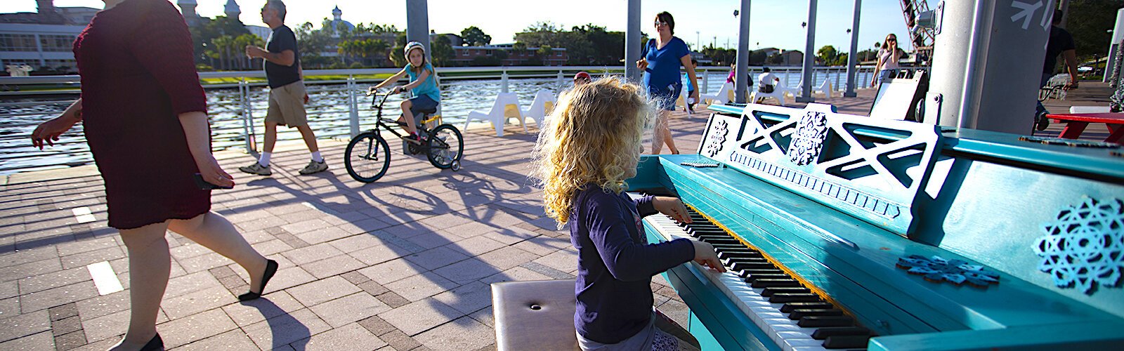 Winter Village at Curtis Hixon Park is complete with a "street piano" adorned with snowflakes for the holidays.