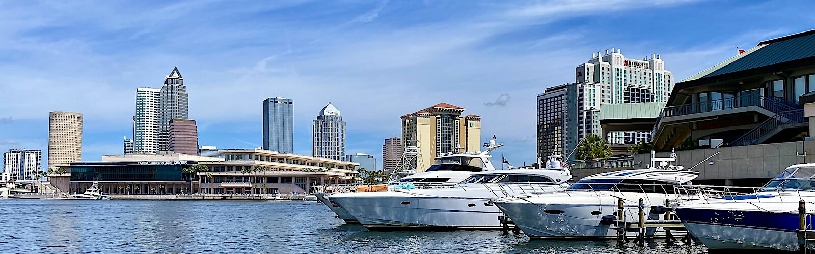 Private yachts dock next to Harbour Island across from the Tampa Convention Center on the water route into downtown Tampa.