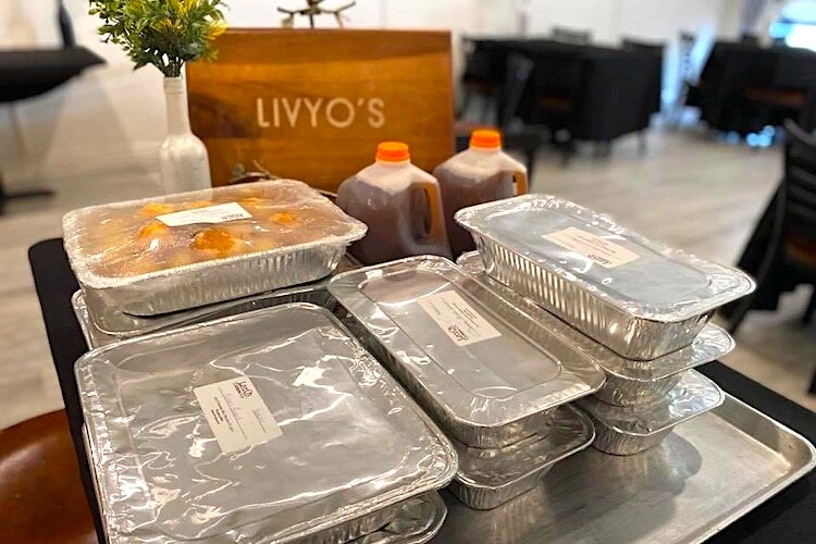 Family-style meals headed out the door at Livy O's Catering and Events in Brandon.