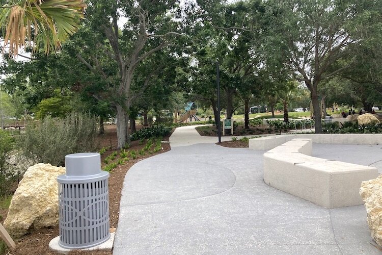 Paved trails invite families to stroll, walk, run, or bicycle the day away in refurbished green space near downtown Clearwater.