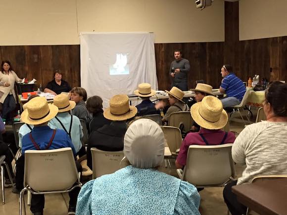 Farrier Jeremiah Sprague addresses hoof care at a free seminar for the Amish community in Quarryville, PA, sponsored by Saddlebred Rescue in New Jersey.