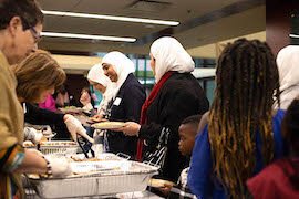 People of all faiths gather for special Thanksgiving dinner welcoming refugees to Tampa.