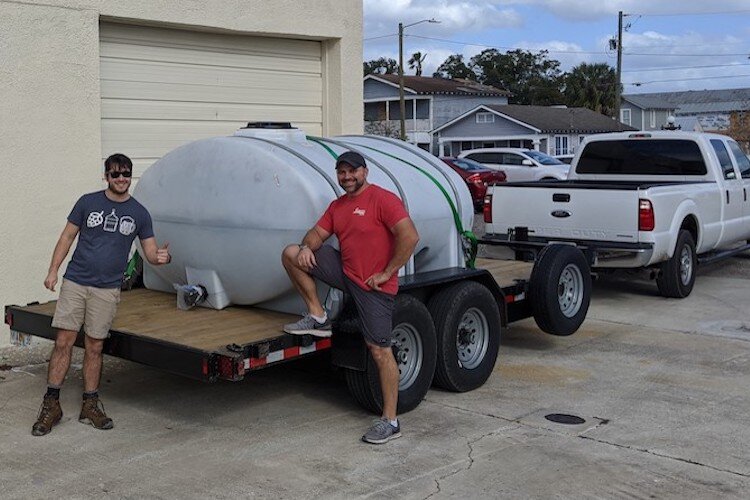 Brad Bunn and Sam Meyers on their way to South Florida sugar cane fields to pick up molasses.