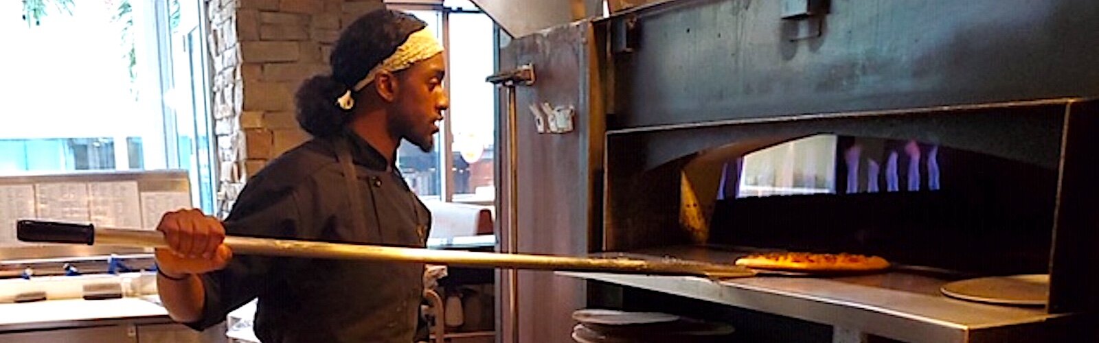 Scholarship winner Lavante Pope puts his training to work at Oak and Stone in St. Petersburg.