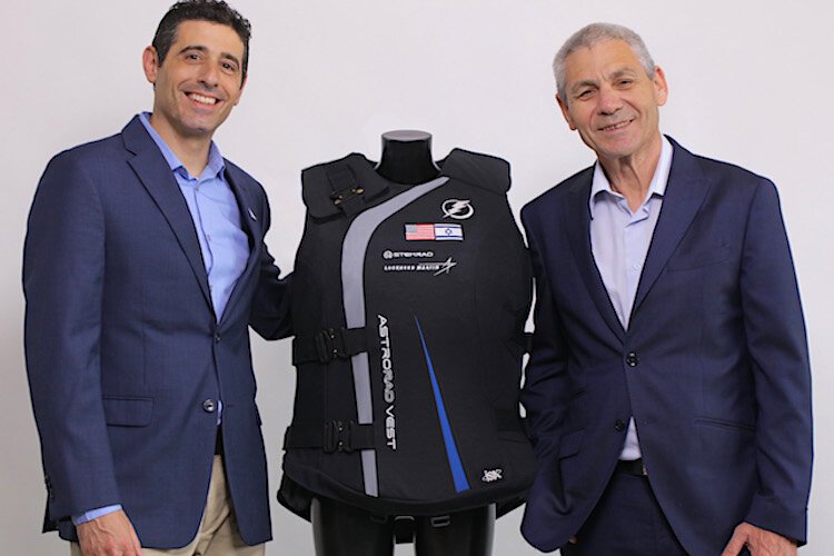 Oren Milstein, PhD. (CEO, co-founder, and chief scientific officer) and Avi Blasberger, director-general of Israel Space Agency, with StemRad’s AstroRad.