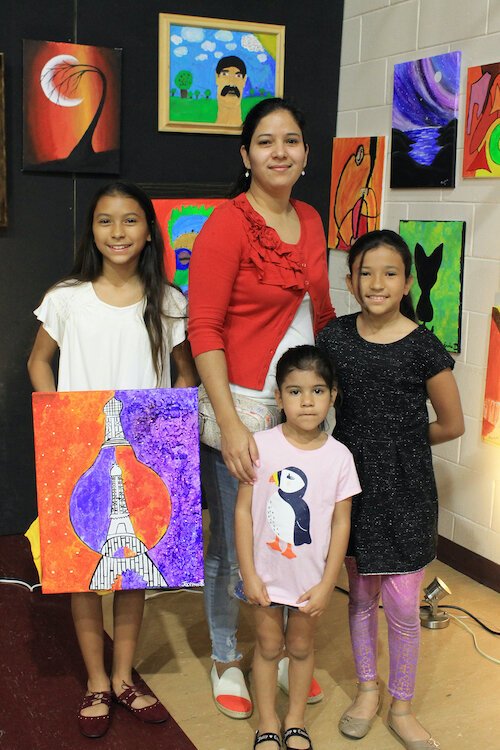 Arts programs provided by the University Area CDC invite participation from all ages.