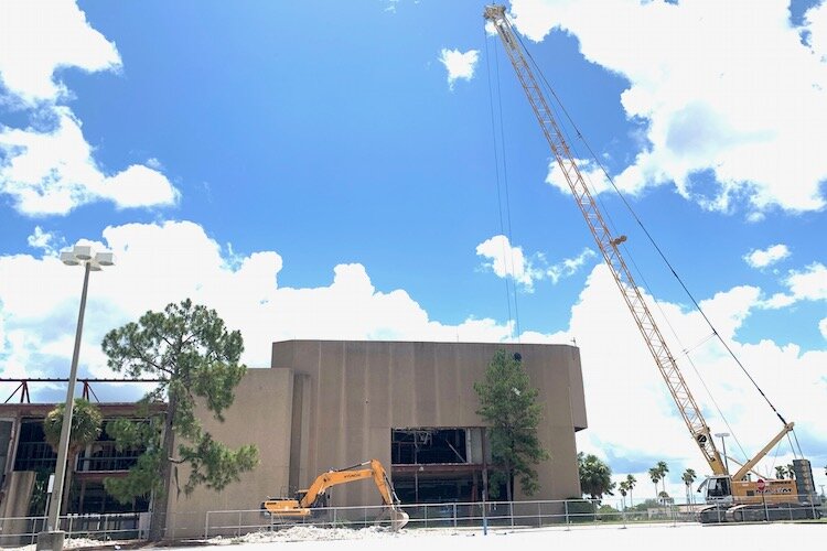 A crane prepares to work on the old JCPenney building at University Mall in north Tampa.