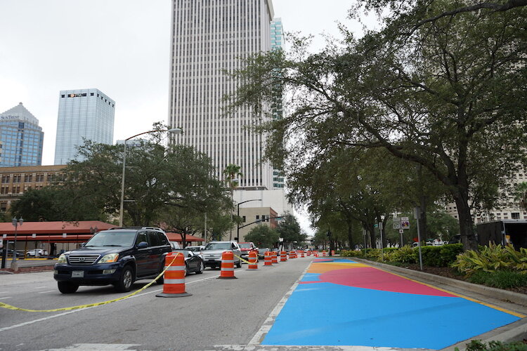 New murals create a colorful street scene along Ashley Drive for motorists entering and exiting the city off I-275.