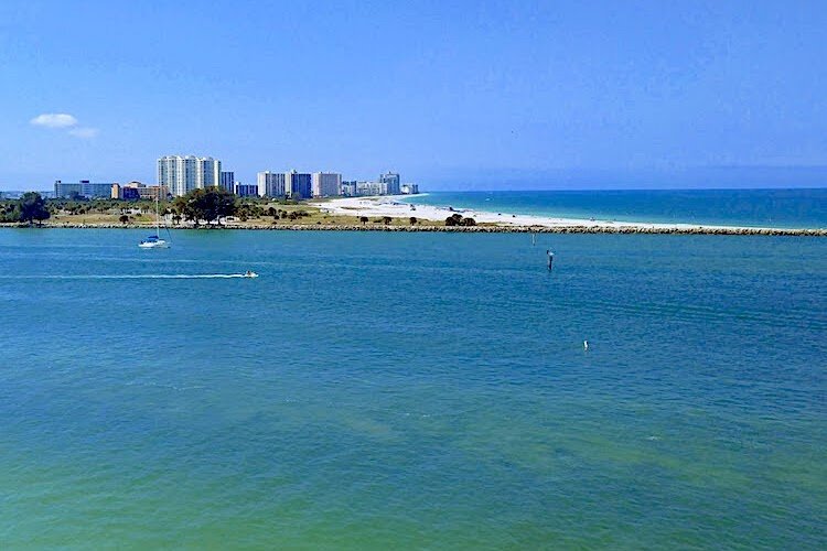 The Clearwater skyline and famous white sand beaches bordering the Gulf of Mexico.