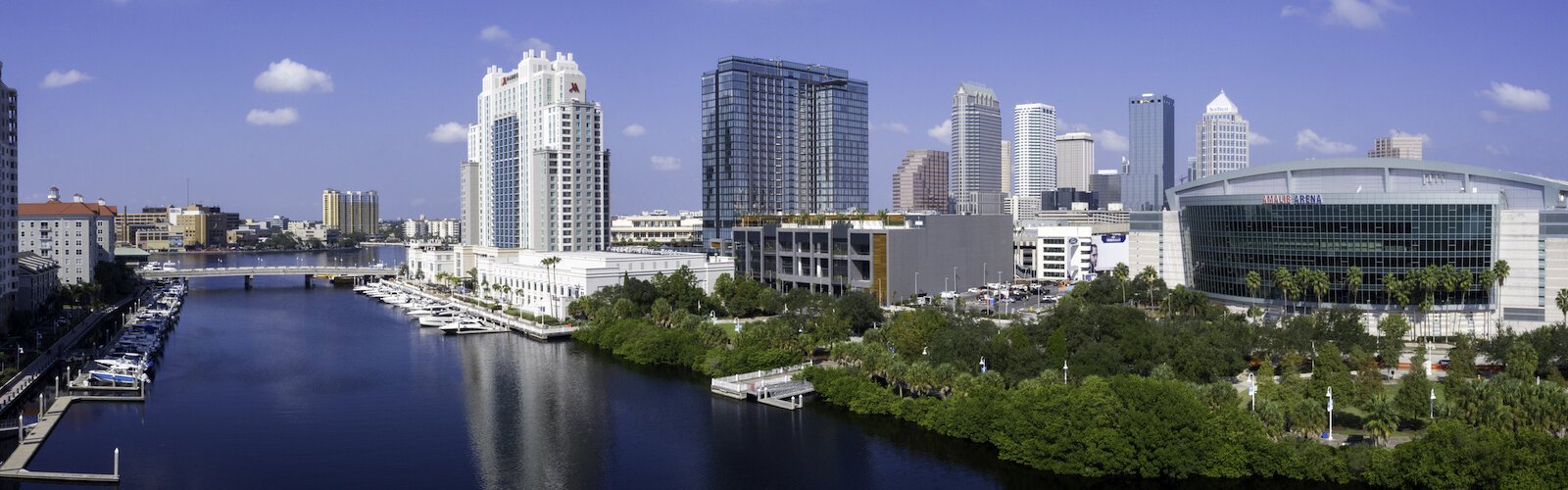 The new JW Marriott Hotel stands out between the Marriott Waterside and Amalie Arena in the Water Street Tampa development.