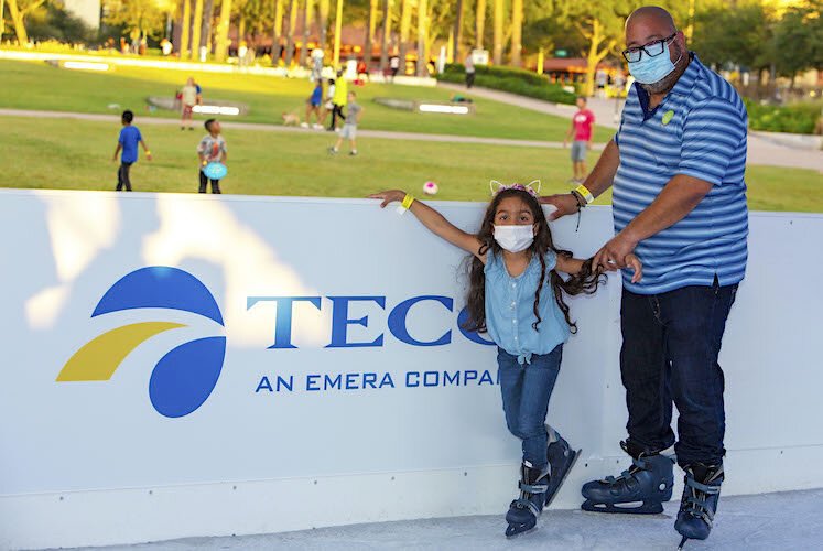 Jose Rivera of Kissimmee brought his daughter Isabella, 8, for a day in Tampa at the Glazer Children’s Museum and skating at the Winter Village.