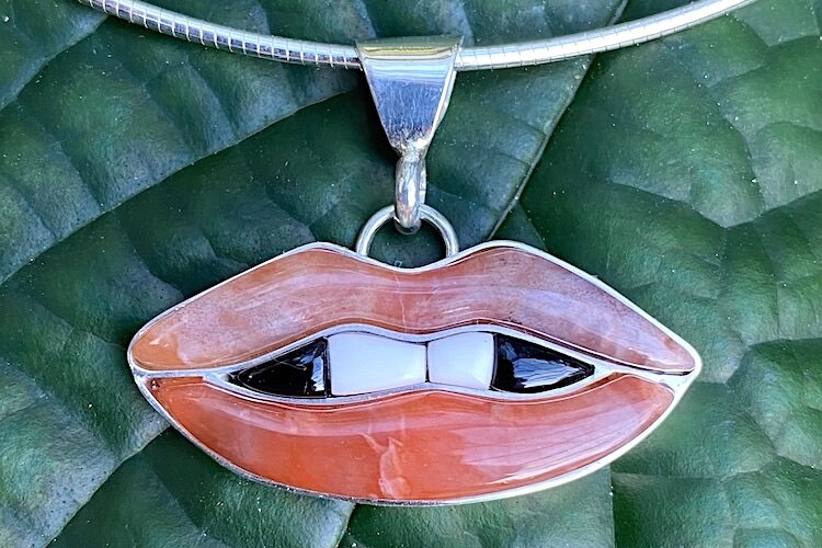 Juicy Lips (with sterling silver channels) features pieces of Brazilian agate, rainbow obsidian, and howlite.