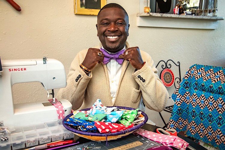 The Dapper Bowtique Founder Travis Ray celebrates his African heritage by centering colorful, patterned African kente fabrics in many of his designs.