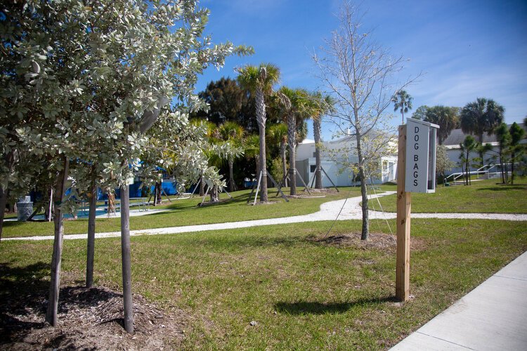A dog walk and dog bags with new landscaping and seated areas are provided for guests at the Seminole Boat Ramp.