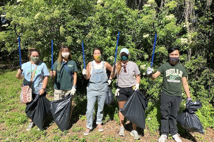 Patel College students studying ecotourism conducted a clean-up at McKay Nature park, next to the Tampa waste to energy plant on Earth Day, 2021.
