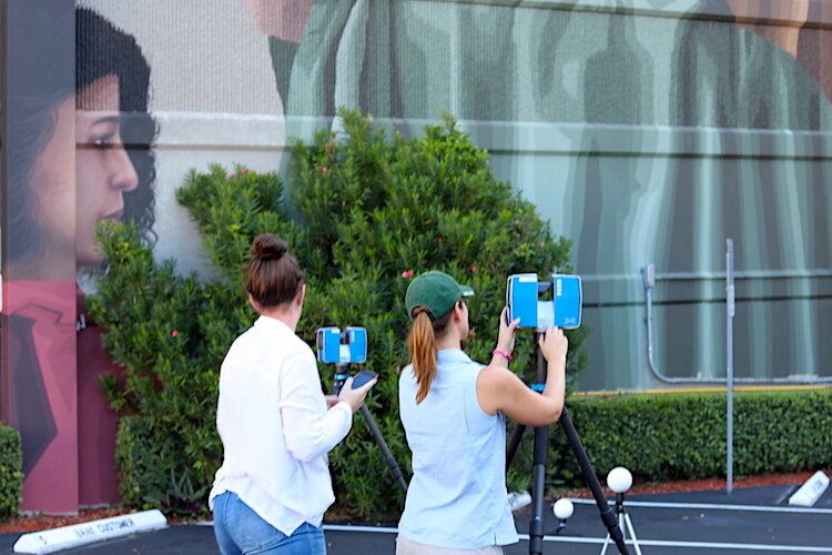 Personnel from Access 3D Lab at USF work to install the new art experience in downtown Clearwater.