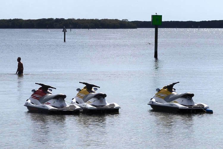 Jet skis are a favorite mode of transportation along any waterfront.