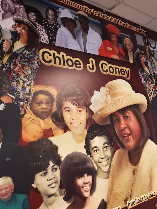 A legacy wall at the Corporation to Develop Communities of Tampa depicts the life of Chloe Coney and her decades of service to the community.