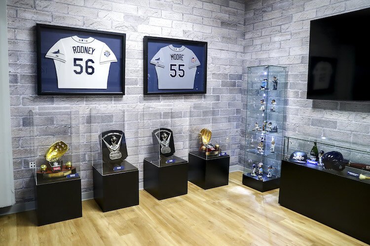 Cy Young Awards (David Price in 2012 and Blake Snell in 2018) along with jerseys worn by No. 55 Matt Moore (2011-16) and No. 56 Fernando Rodney (2012-2013) are on display at the new Rays Museum.