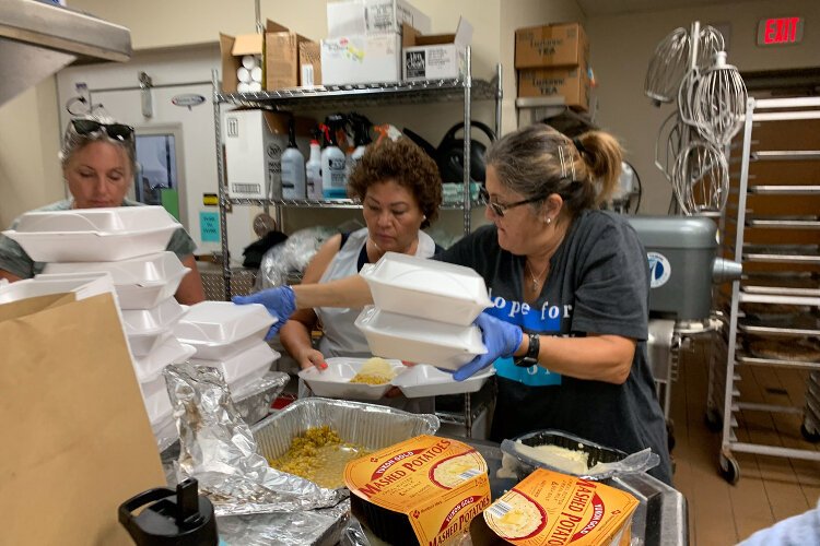 Volunteers at South Tampa Fellowship prepared more than 100 Thanksgiving meals for Afghan refugees.