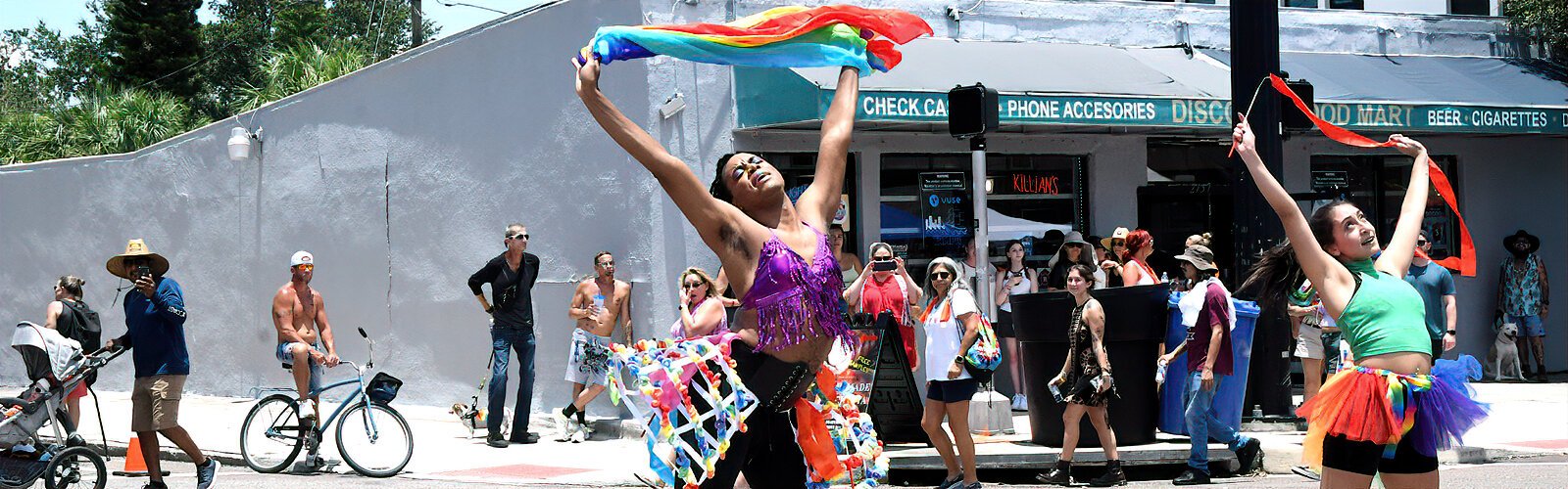 Alex Jones, founder and artistic director of the St. Pete dance company projectALCHEMY, performs in the street with his dancers during the St. Pete Pride street festival in the Grand Central District.