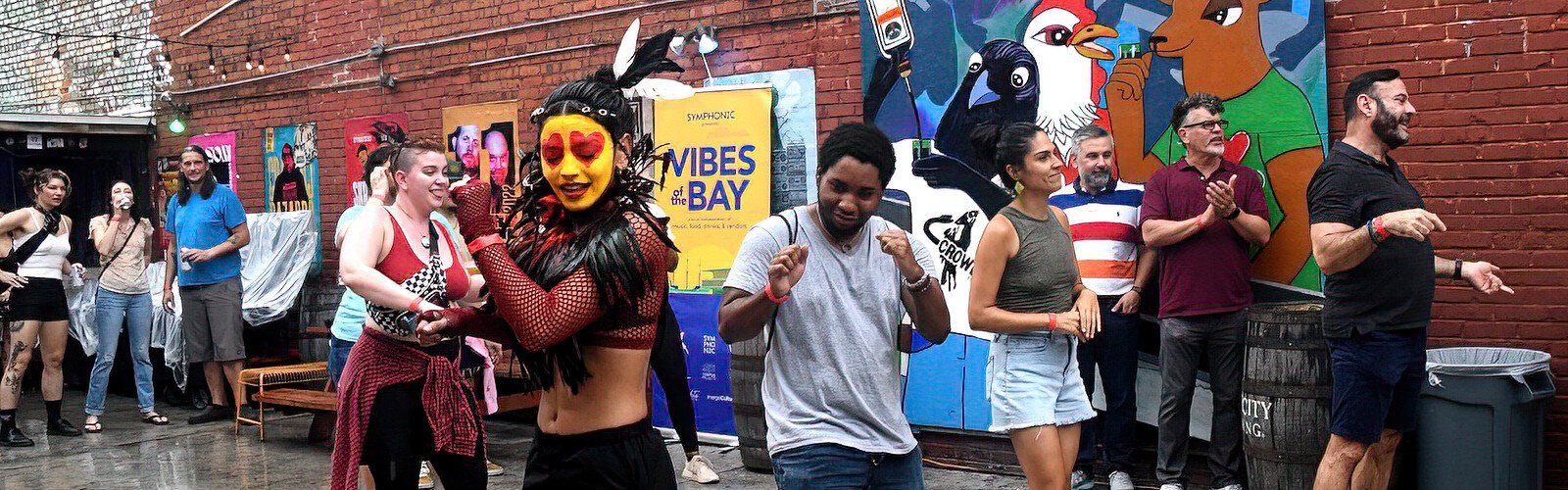 In collaboration with the Bomba dance group, Puerto Rican multimedia artist Selena Ferrer dances to their tune in the Crowbar courtyard at the Vibes of the Bay festival.