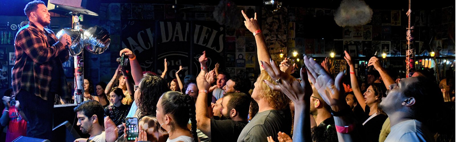  The audience applauds rapper Perception during Vibes of the Bay, held at a packed Crowbar in Tampa’s Ybor City on September 30th.