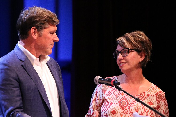 Mike Lally and Tricia Manning, co-chairs of Social Venture Partners, at SVP's 2022 Fast Pitch competition, a Shark Tank-style event for local nonprofits.